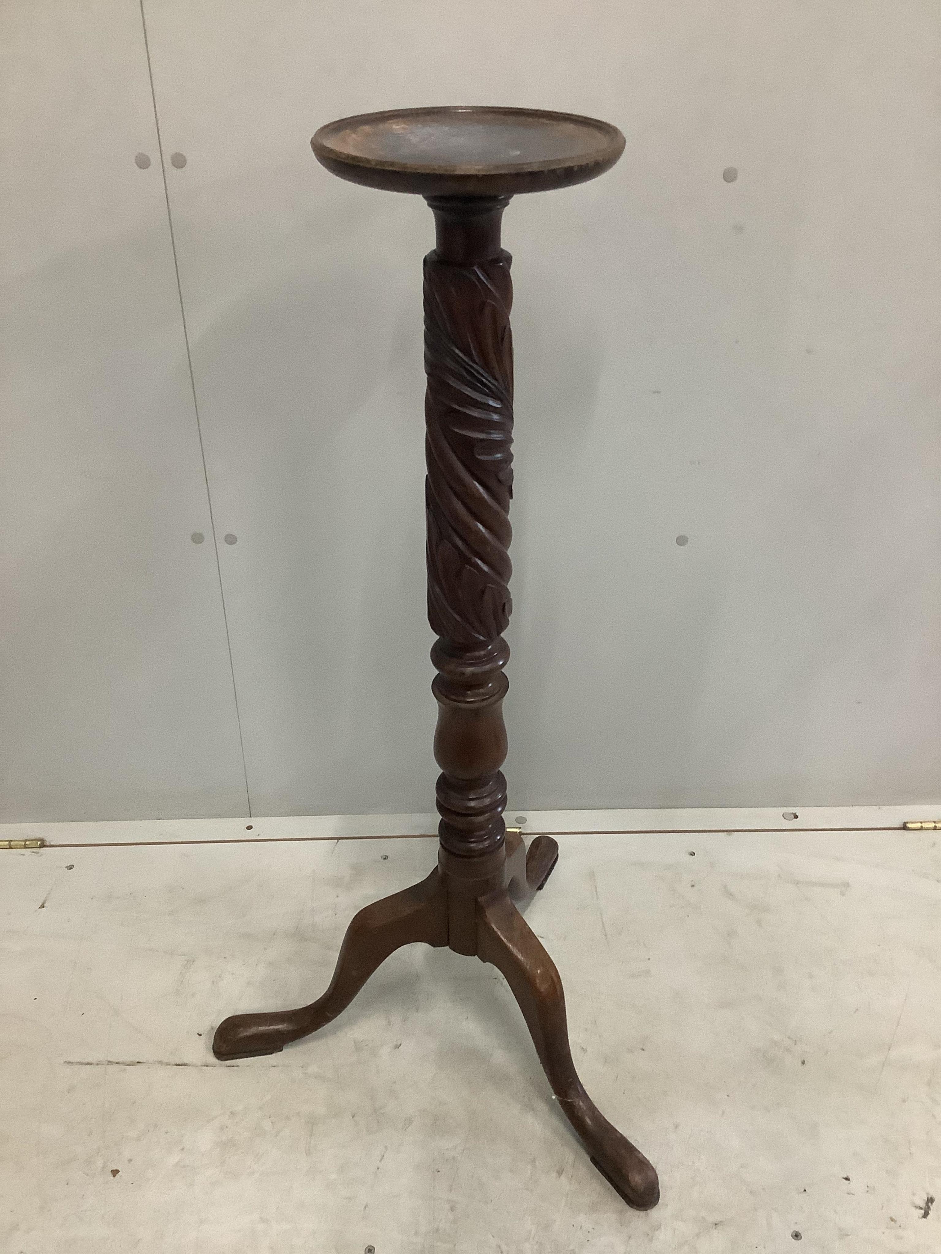 A 19th century Asian hardwood lamp standard carved with dragons, height 150cm, together with a carved mahogany torchere, height 100cm. Condition - fair